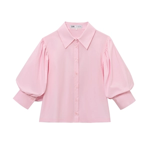 Pink short sleeve pullover blouse with puffy gathered sleeve design on white background