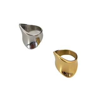 Minimalist irregular fluid rings in gold and silver finish with polished wavy design