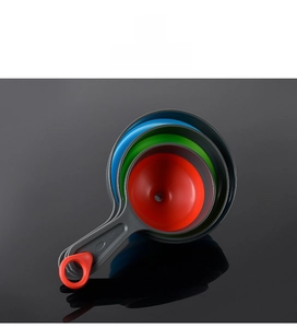 Nesting stackable kitchen funnel set with wide and narrow mouths and hanging ring