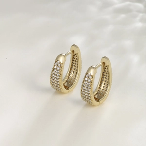 Elegant U-shaped gold hoop earrings with white pave zircons and water ripple light shadows