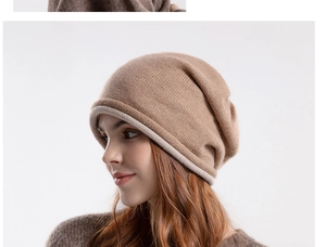 Detailed close-up of camel knit beanie showing soft wool texture and folded cuff edge