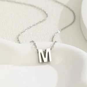 Polished silver stainless steel necklace featuring a minimalist capital letter M pendant