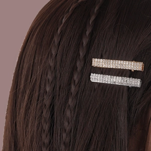 Elegant gold and silver rhinestone hair clips set shown on dark brown hair