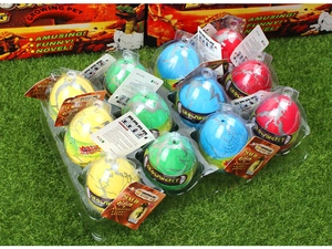 Set of 12 colorful crack-patterned dinosaur eggs on artificial grass tray