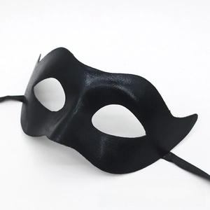 Detailed view of the wavy edges and texture on a black PVC half-face party mask