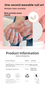 Detailed view of long coffin nails with pink and blue gradient and heart design