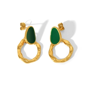 Detail of 18K gold-plated bohemian earrings with emerald green enamel teardrop pendants