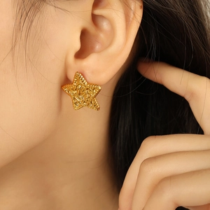 French style gold star stud earrings with pleated texture in liquid metal finish