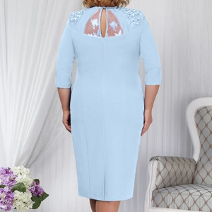Light blue A-line plus size dress featuring elegant lace back detail and 3/4 sleeves