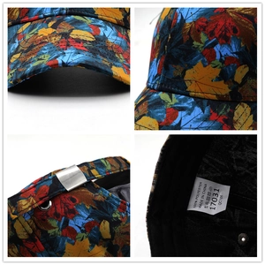 Adjustable baseball cap featuring a vibrant colorful maple leaf print and metal buckle
