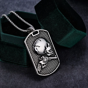 Punk style stainless steel dog tag necklace with embossed skull and revolver pistol