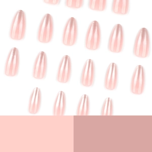 Short almond press-on nails with pink pearl gradient finish on a white background