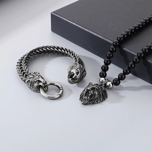 Vintage stainless steel lion head jewelry set with black onyx bead necklace and bracelet