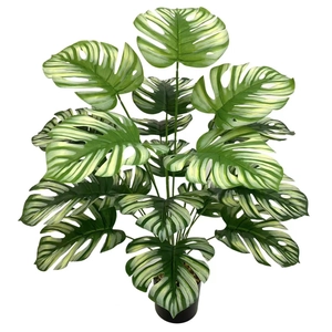 Artificial variegated Monstera plant in black pot for Nordic home decor aesthetic
