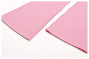 Detail of flared hem on pink yoga pants with professional double-needle stitching