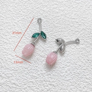 Detailed view of pink tulip pendant with dimensions 31mm by 13mm for DIY jewelry