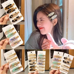 Set of colorful acetate hair clips with leopard print and marble patterns for women
