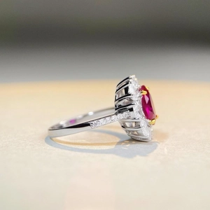 Elegant 925 silver oval ruby ring with white zircon halo and side diamond accents