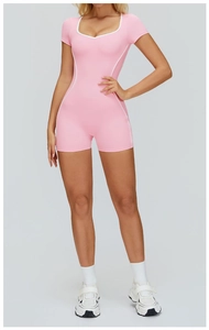 Pink athletic bodysuit with white piping detail and short sleeves for fitness workout