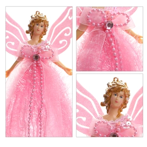 Detail of pink Christmas angel ornament showing sequins, beads, and plush fabric textures