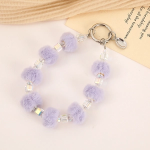 Purple plush ball beaded keychain charm with clear faceted beads and metal ring clip
