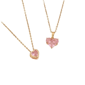 Two gold necklaces with pink heart zircon pendants on a clean white background