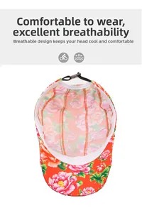 Detail view of ethnic floral print beret showing breathable fabric and adjustable strap