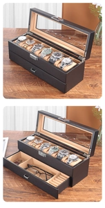 Makro-Detail von Carbon-Textur und weichem beigem Samtfutter in einer Doppel-Uhrenbox