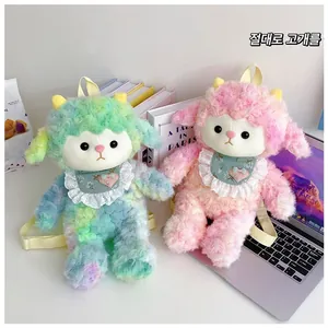 Detail of plush sheep backpacks in pastel gradients with lace bibs and yellow straps