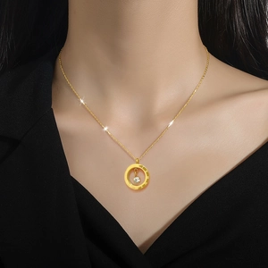 Titanium steel gold necklace with a Roman numeral circle pendant and sparkling gemstone