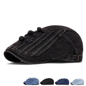 Vintage washed denim beret cap with traditional frog buckle and adjustable metal strap