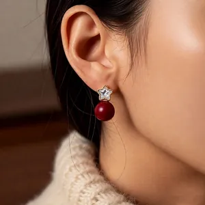 18K gold plated star earrings with deep red pearl drop in a vintage french style