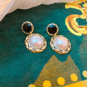 Vintage style gold and black enamel earrings with round pearls and quilted texture
