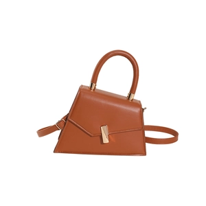 Brown vintage small square handbag with gold metal clasp and adjustable shoulder strap