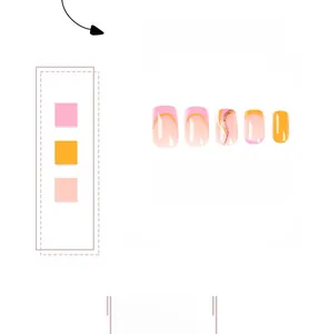 Detail of pink and orange French wave press-on nails with tiny rhinestone accents