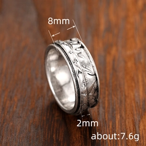 Retro 8mm spinner ring with engraved mountain peaks and vintage silver finish