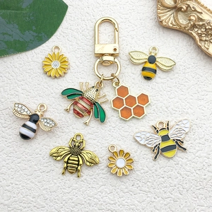 DIY bee and flower alloy pendant set with gold finish for handmade jewelry making