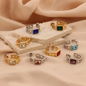 Elegant rectangular zircon earrings with textured gold and silver finish on stone