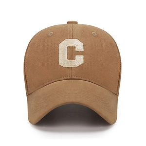 Front view of khaki cotton baseball cap with white embroidered C letter and curved brim