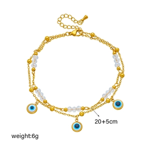 Multilayer gold stainless steel anklet with blue evil eye charms and white beads