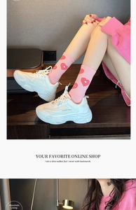 Pink heart patterned socks paired with chunky white fashion sneakers in a collage view