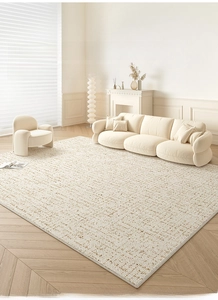 Detailed macro texture of a modern cream-colored waterproof rug with brown mottled patterns