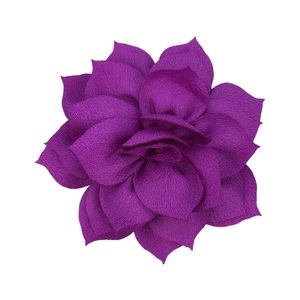 Macro detail of multi-layered purple fabric lotus flower for DIY hair accessories