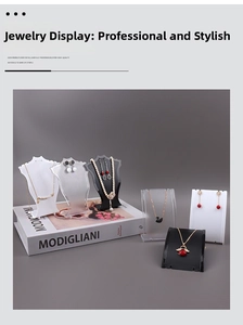 Detail of plastic jewelry display stands for necklaces and earrings in various shapes