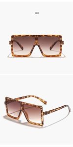 Detail view of children square sunglasses with leopard frame and brown gradient lenses