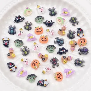 Colorful Halloween cartoon resin nail charms including pumpkin, ghost, and spider decor
