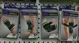Set di 4 supporti sportivi per palmo, caviglia, gomito e ginocchio in nero-verde