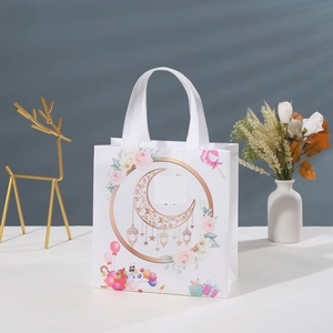 White non-woven shopping gift bag with cartoon moon and floral print for festive occasions