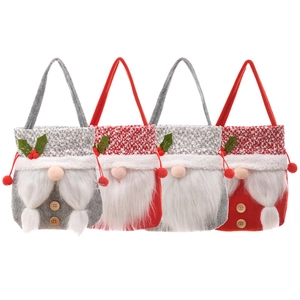 Set of 4 Christmas gnome gift bags with felt material and festive berry decorations