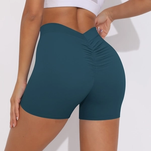 Close-up of teal high-waist scrunch butt yoga shorts with V-shaped waistband design
